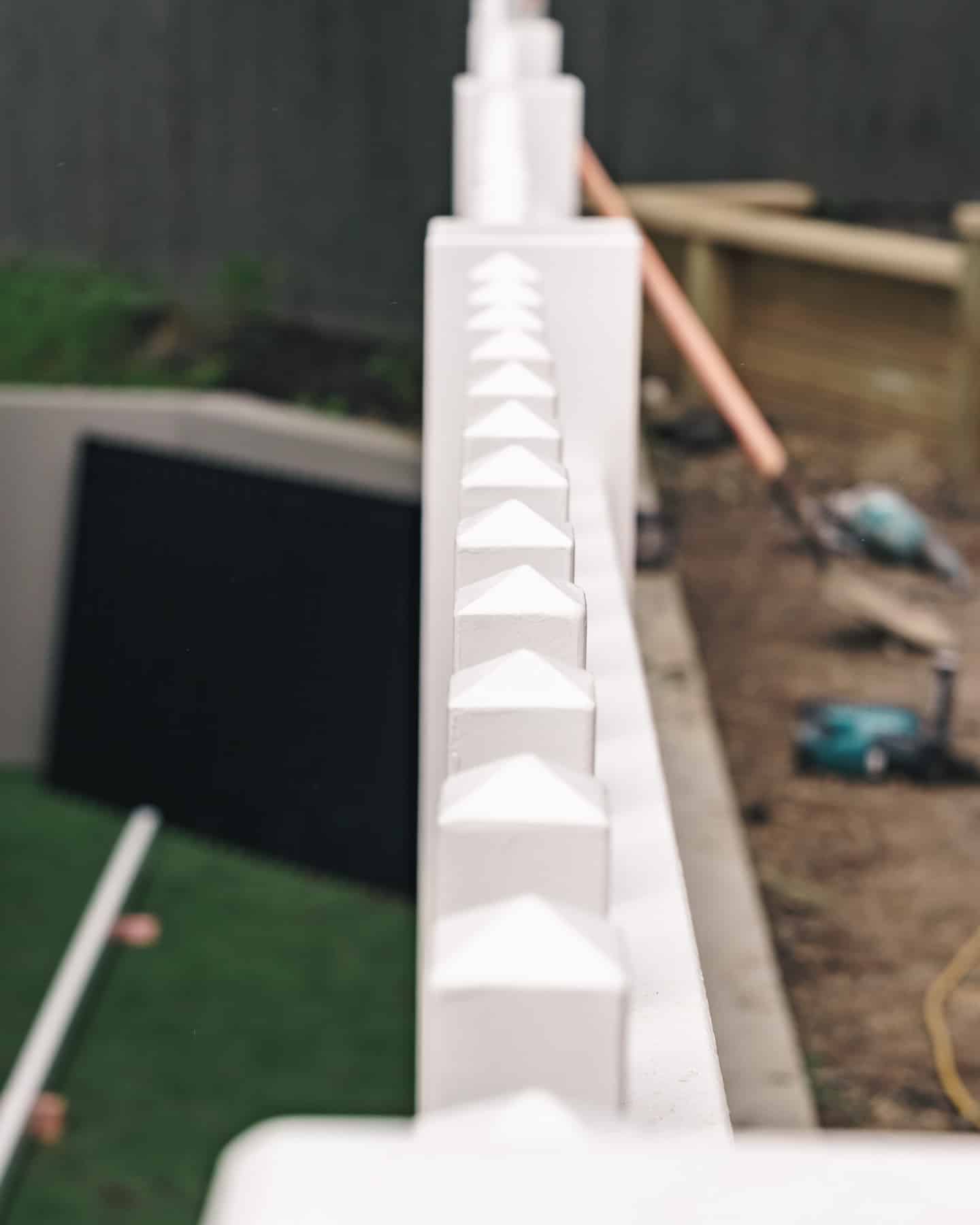 White fence post detail